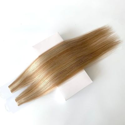 Estensioni di capelli con nastro adesivo con cuticule russa e nastro sottile