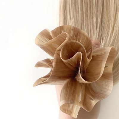 Estensioni di capelli grezzi 100% capelli umani doppiamente tracciati in PU