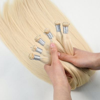 50.00cm * 8.00cm * 3.00cm Dimensione del pacchetto Genius Weft Remy 12A Grade Hair Extensions